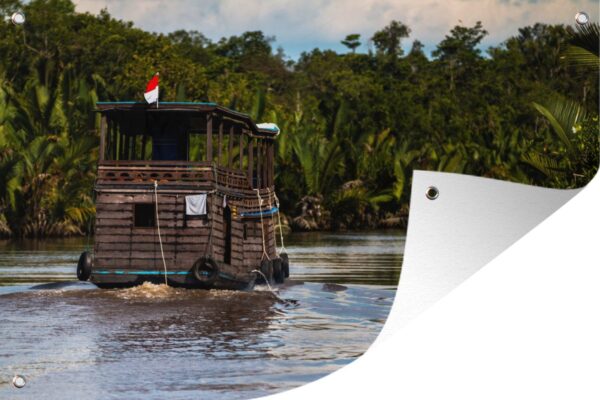 Tuinposter - Tuindoek - Tuinposters buiten - Boot op een rivier in het Nationaal park Tanjung Putung in Indonesië - 120x80 cm - Tuin